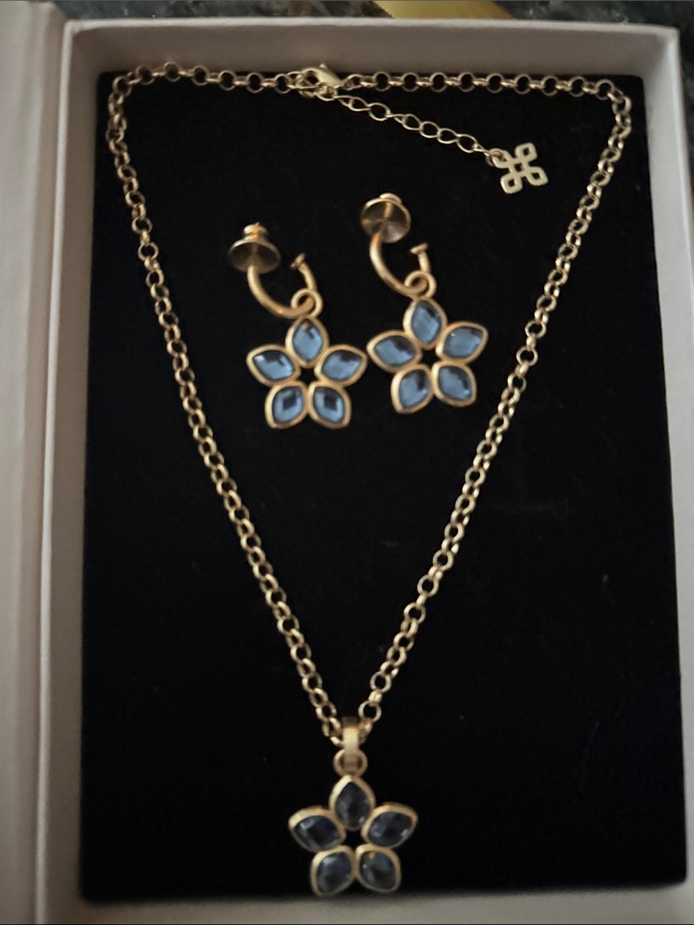 Betty Gold Flower Pendant Necklace and Earrings Set with Light Blue Accents